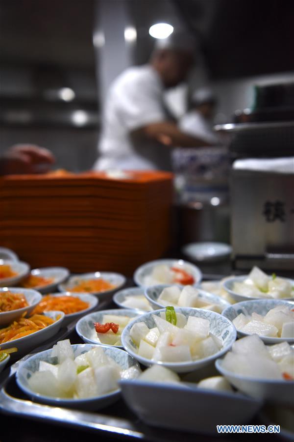 Lanzhou beef noodles wins fame both at home and abroad