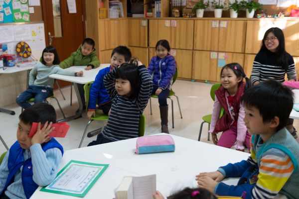 Students at ETU School are listening attentively i